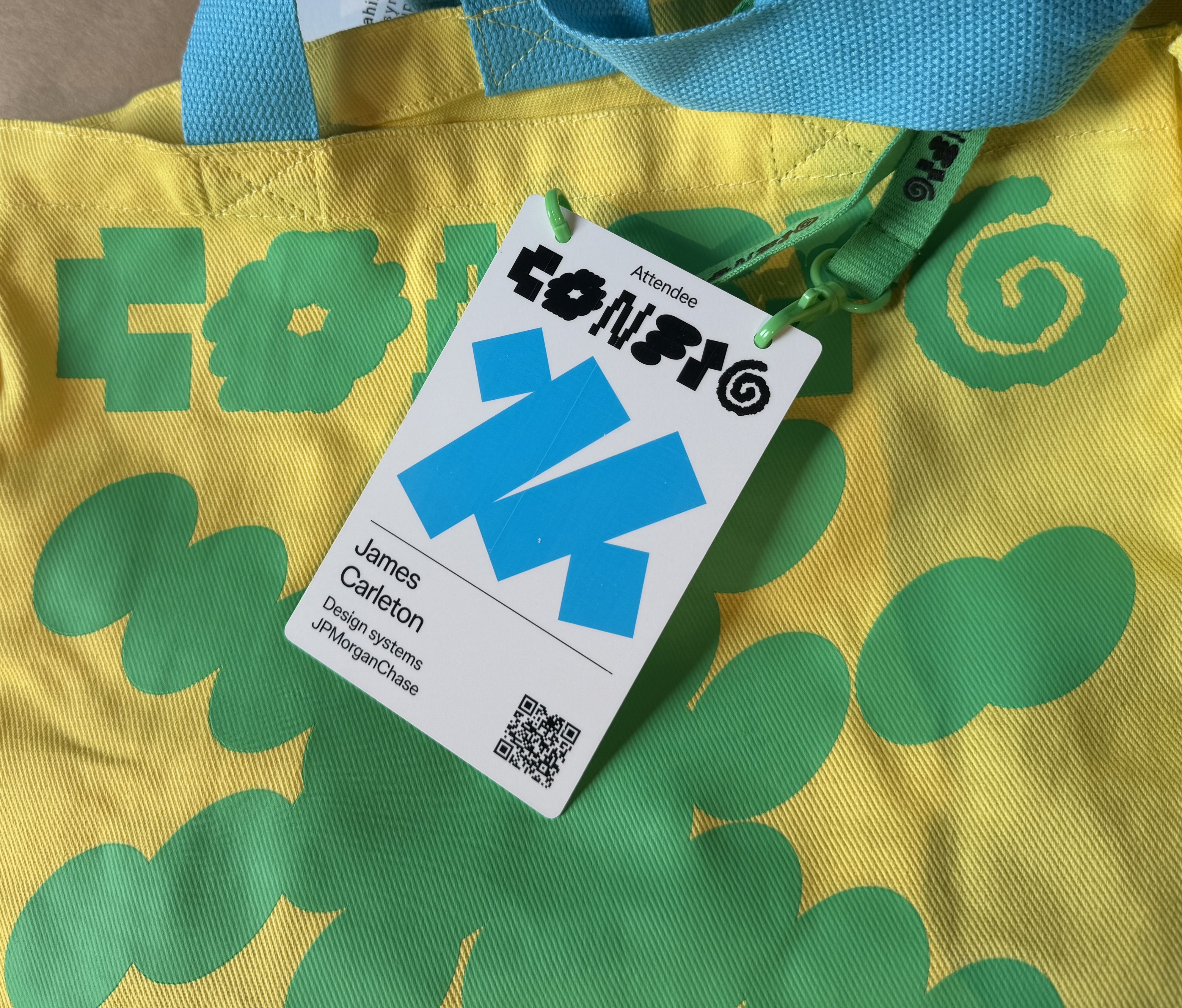 Conference badge and lanyard with Config 2026 logo
